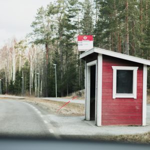 A red Nordic bus shelter