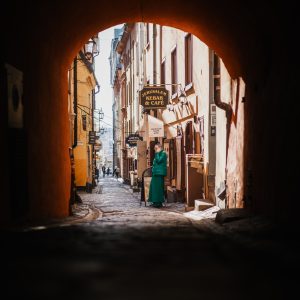 Lady in Green in alleyway at Gamla Stan Sewden